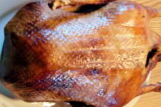 Гусь фаршированный диким рисом